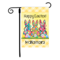 Easter-themed garden flag with colorful bunnies and eggs, personalized with a name.