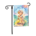 Decorative garden flag with a child holding a lantern and 'Let Your Light Shine' text on a colorful background.
